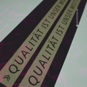 Konturschnitt des Schriftzugs "Qualität ist unser Motto."
